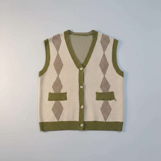 Green and beige argyle patterned sweater vest on a white fur background