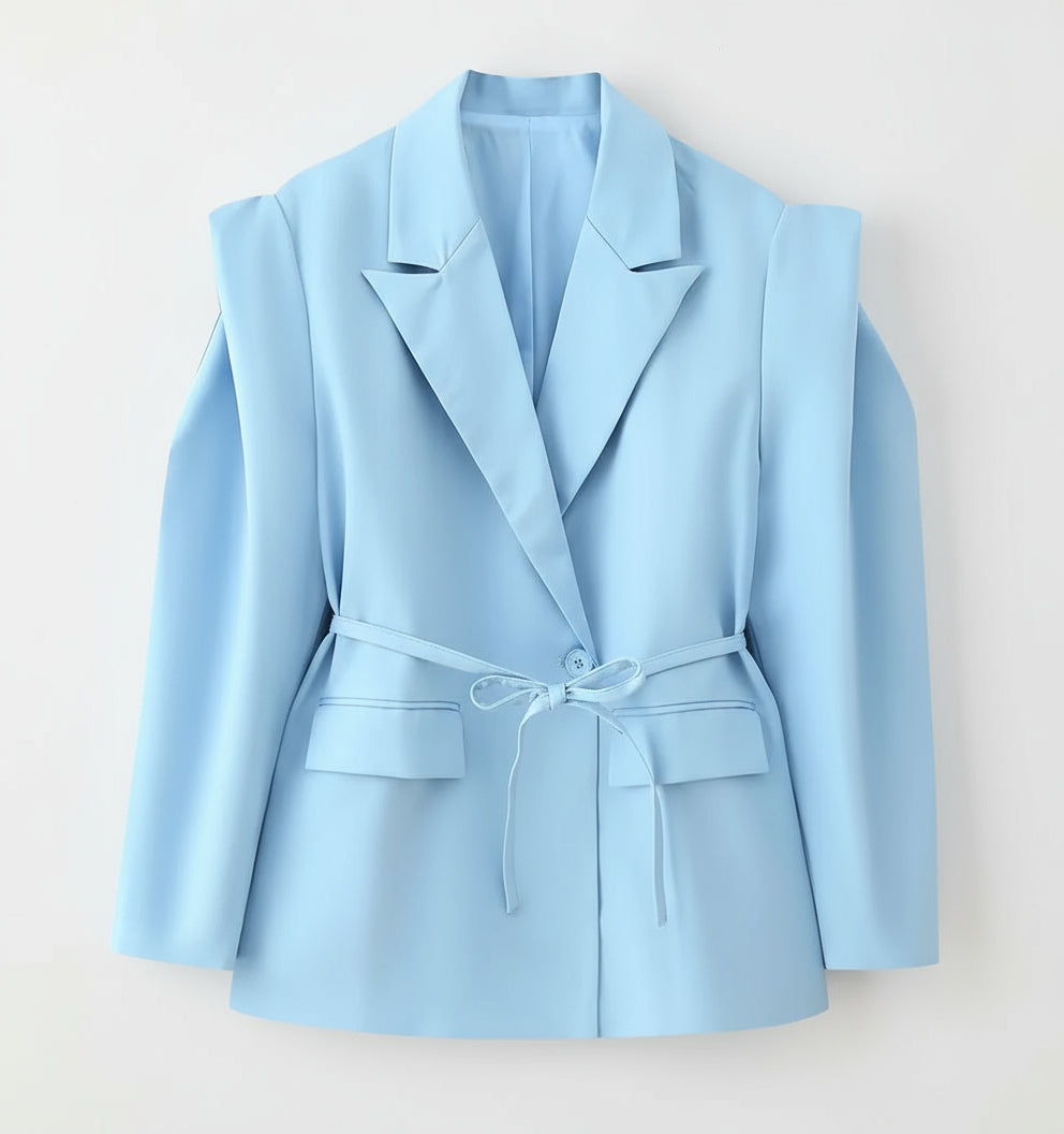 Light blue blazer with a belt on a white background