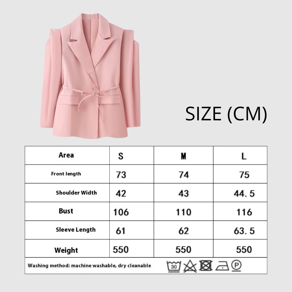 Pink blazer with size chart on a light gray background