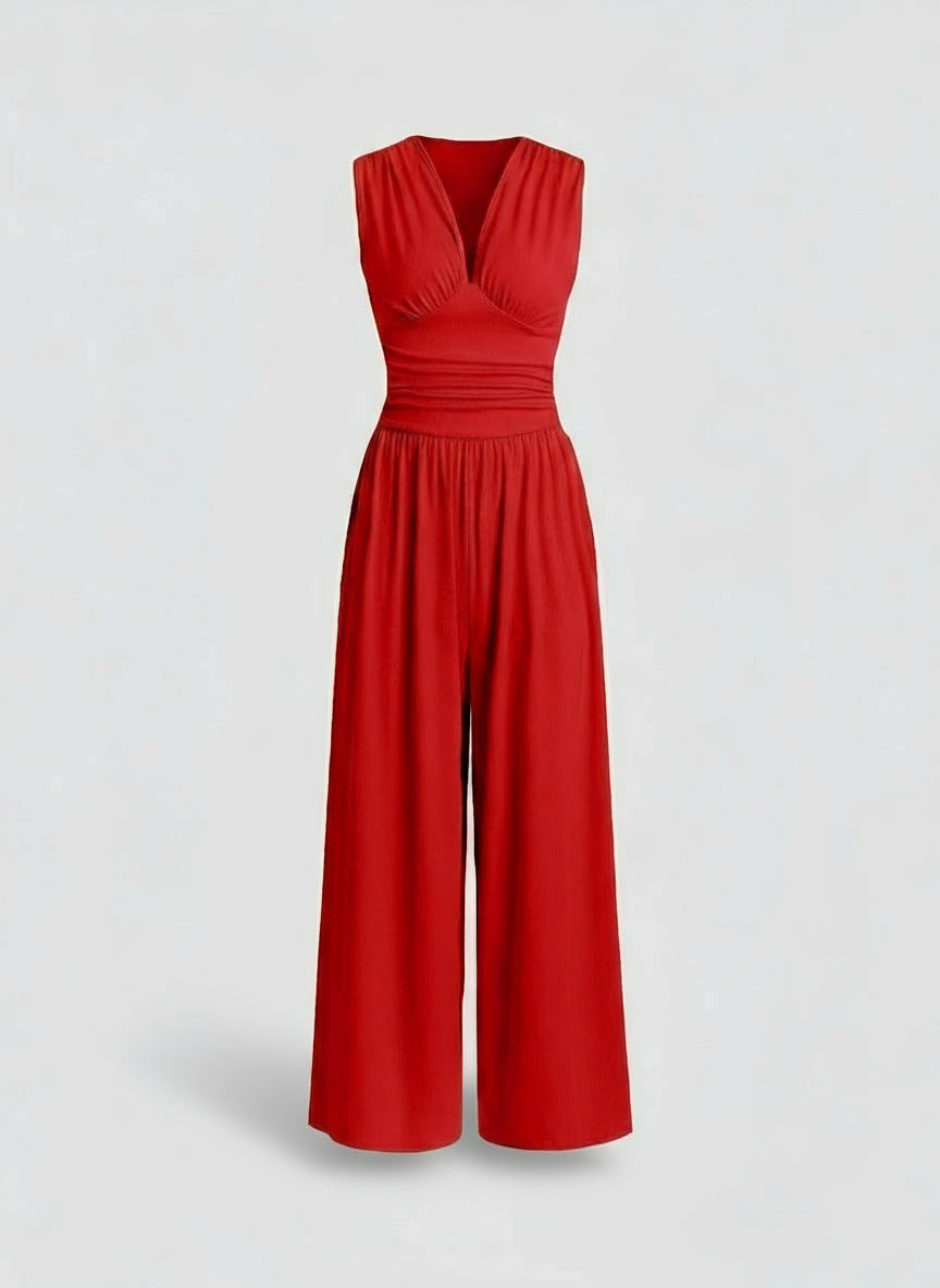 Red jumpsuit on a light gray background