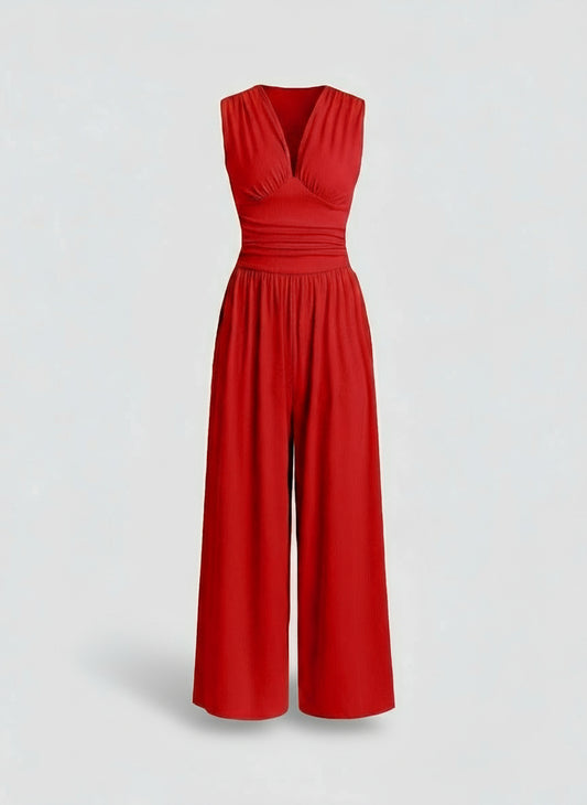 Red jumpsuit on a light gray background
