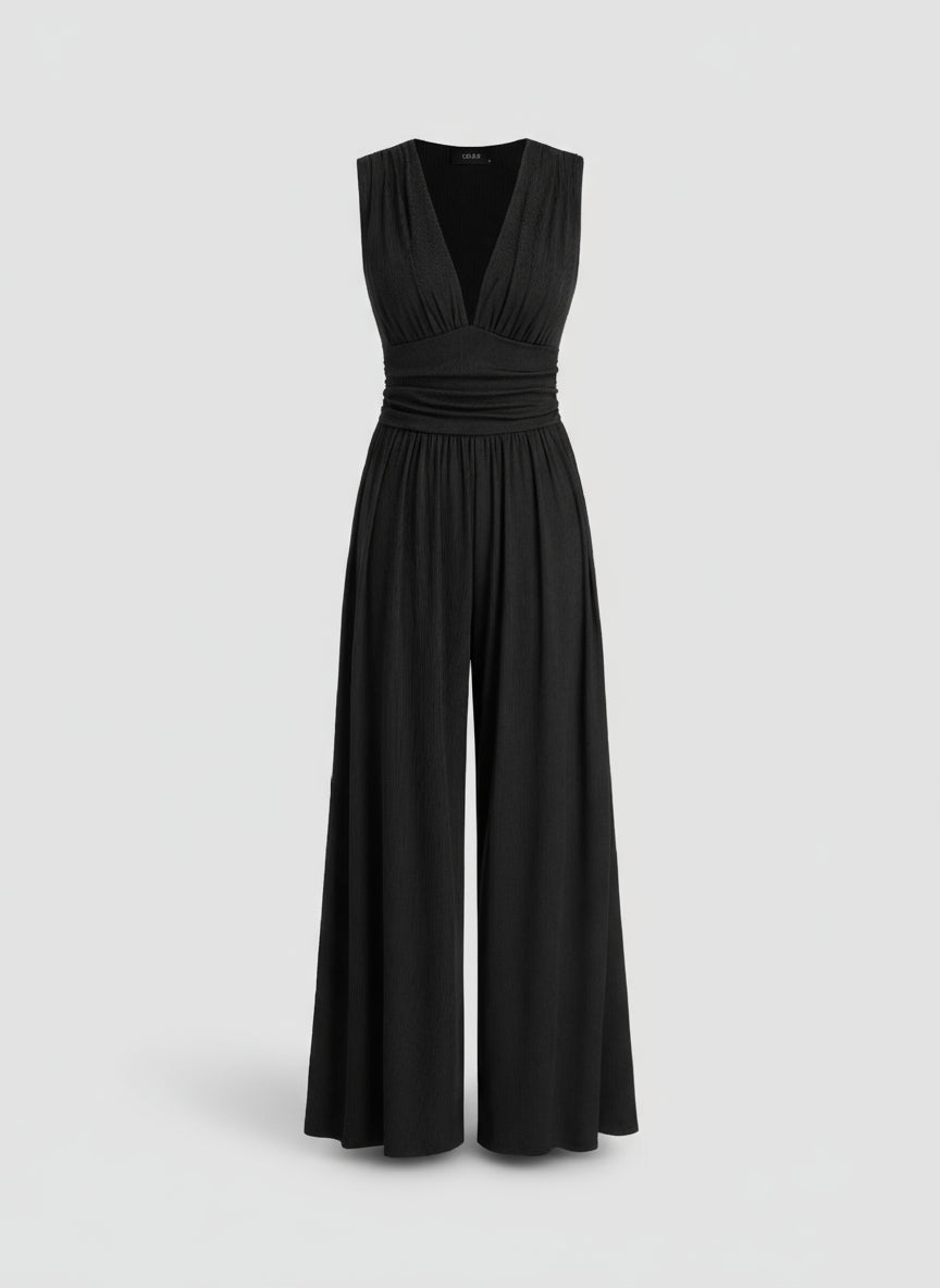Black jumpsuit on a light agray background