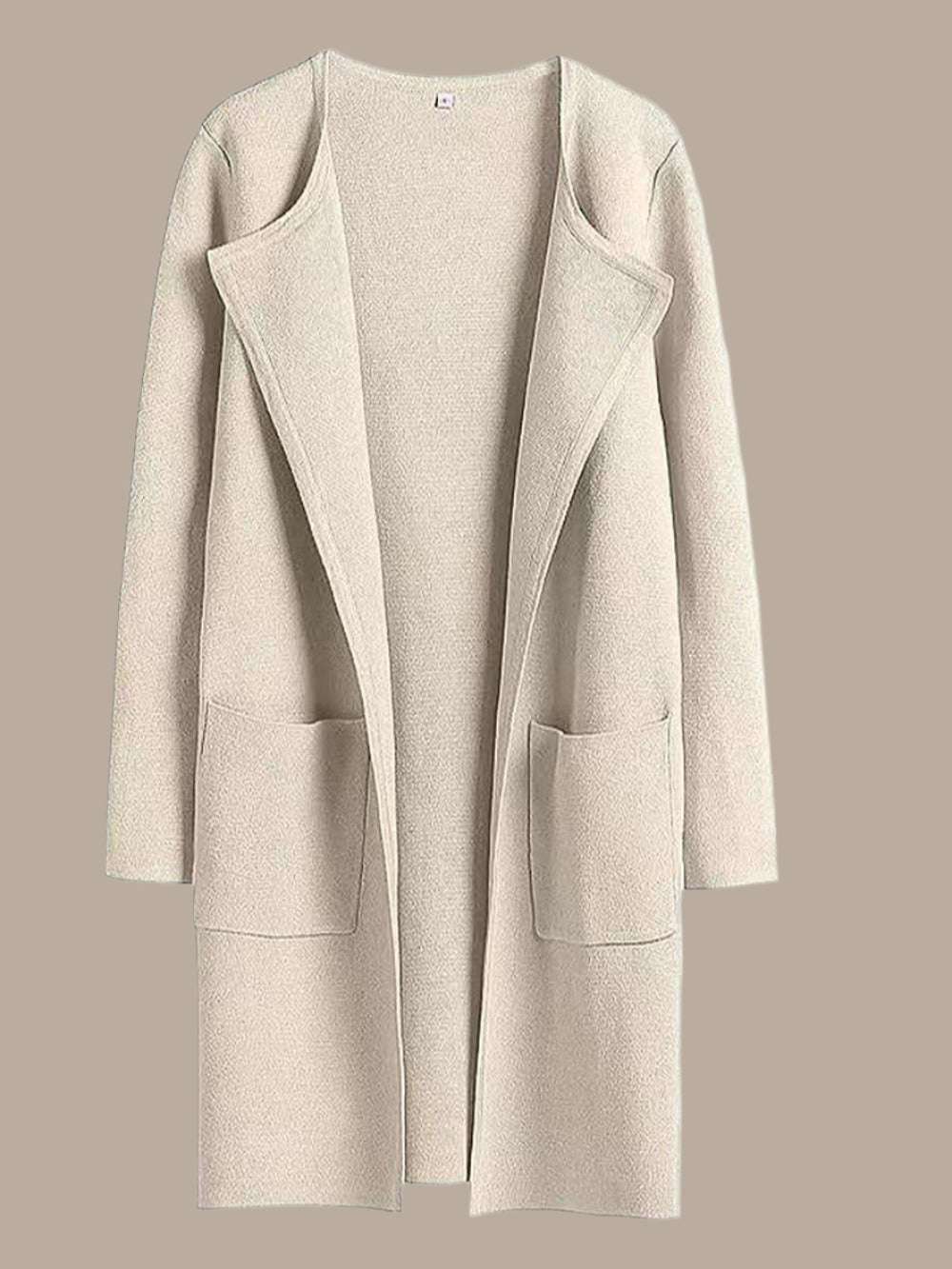 Beige overcoat on a white background