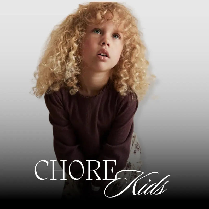 Child with curly hair wearing a brown shirt against a plain background, with 'Chore Kids' text overlay.