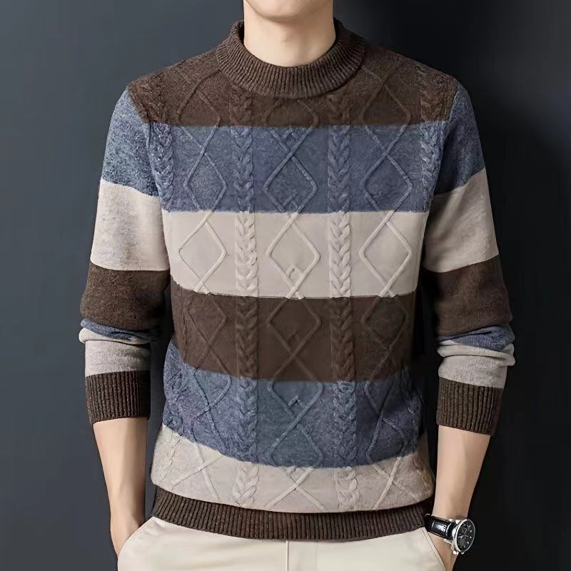 Multicolored patterned sweater worn by a person on a dark background