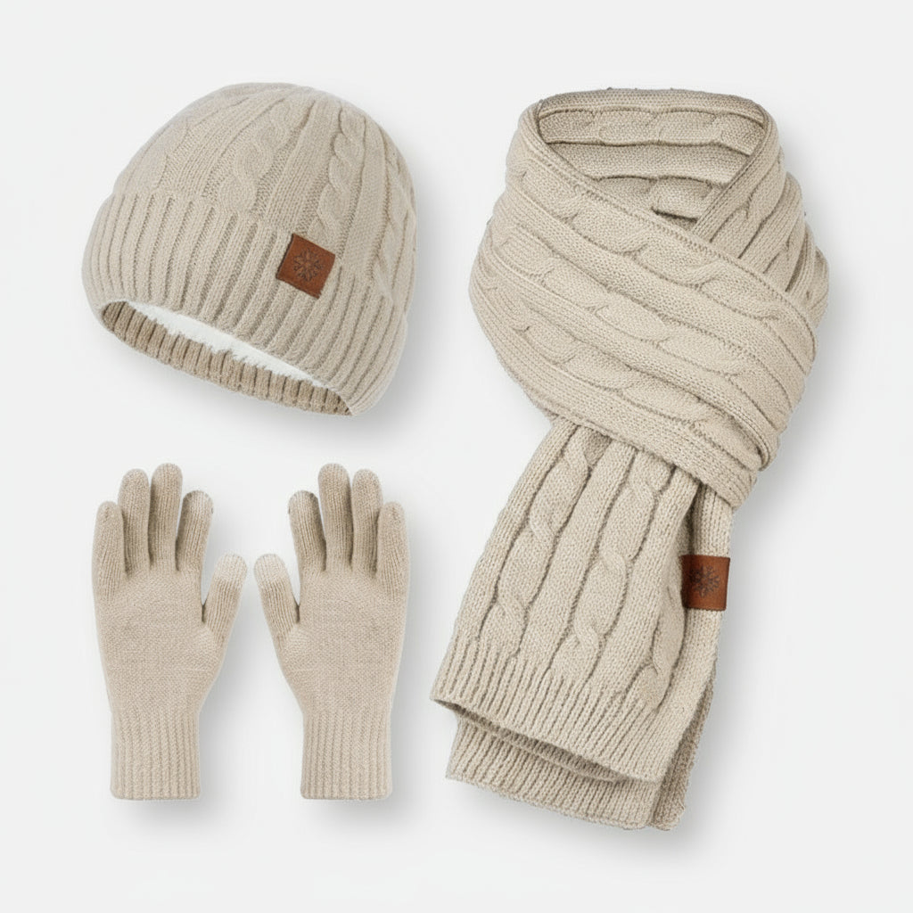A set of women's knitted hat, scarf, and gloves in beige color, displayed on a white background.