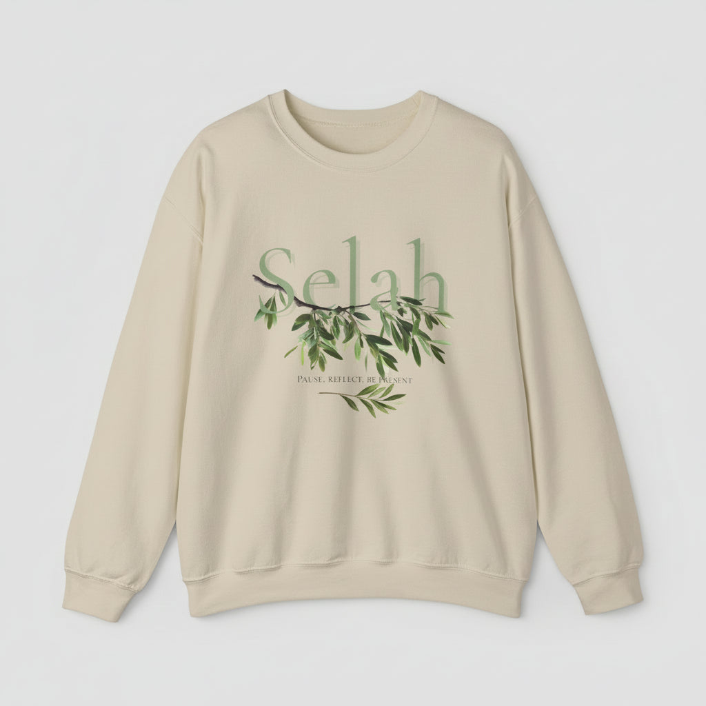 Beige sweatshirt with 'Selah' and olive branch design on a white background