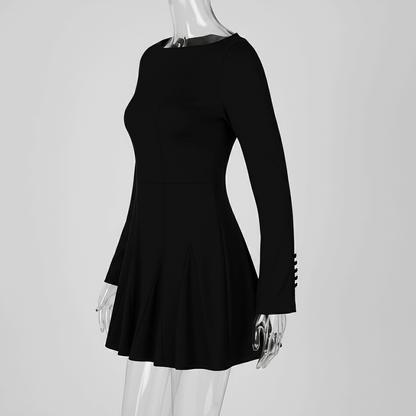 Black dress on a mannequin against a white background