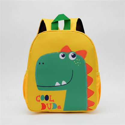 Children's backpack with dinosaur design and 'Cool Dude' text on a white background