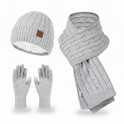 Gray knit hat, scarf, and gloves set on a white background