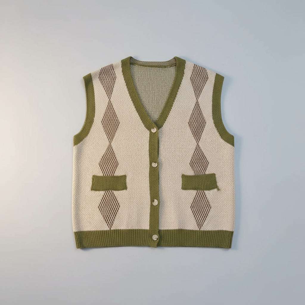 Green and beige argyle patterned sweater vest on a white fur background