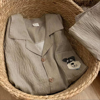 Light brown shirt with a patch on a woven surface
