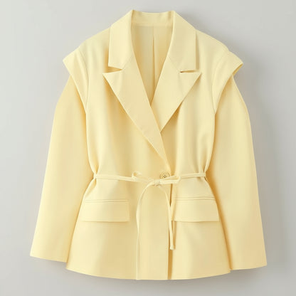 Light yellow blazer on a white background