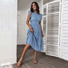 Damenkleid im Retro-Stil mit hoher Taille und Rundhalsausschnitt und Blumenmuster