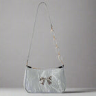 Women's Small One Shoulder Bag with a Metal Bow