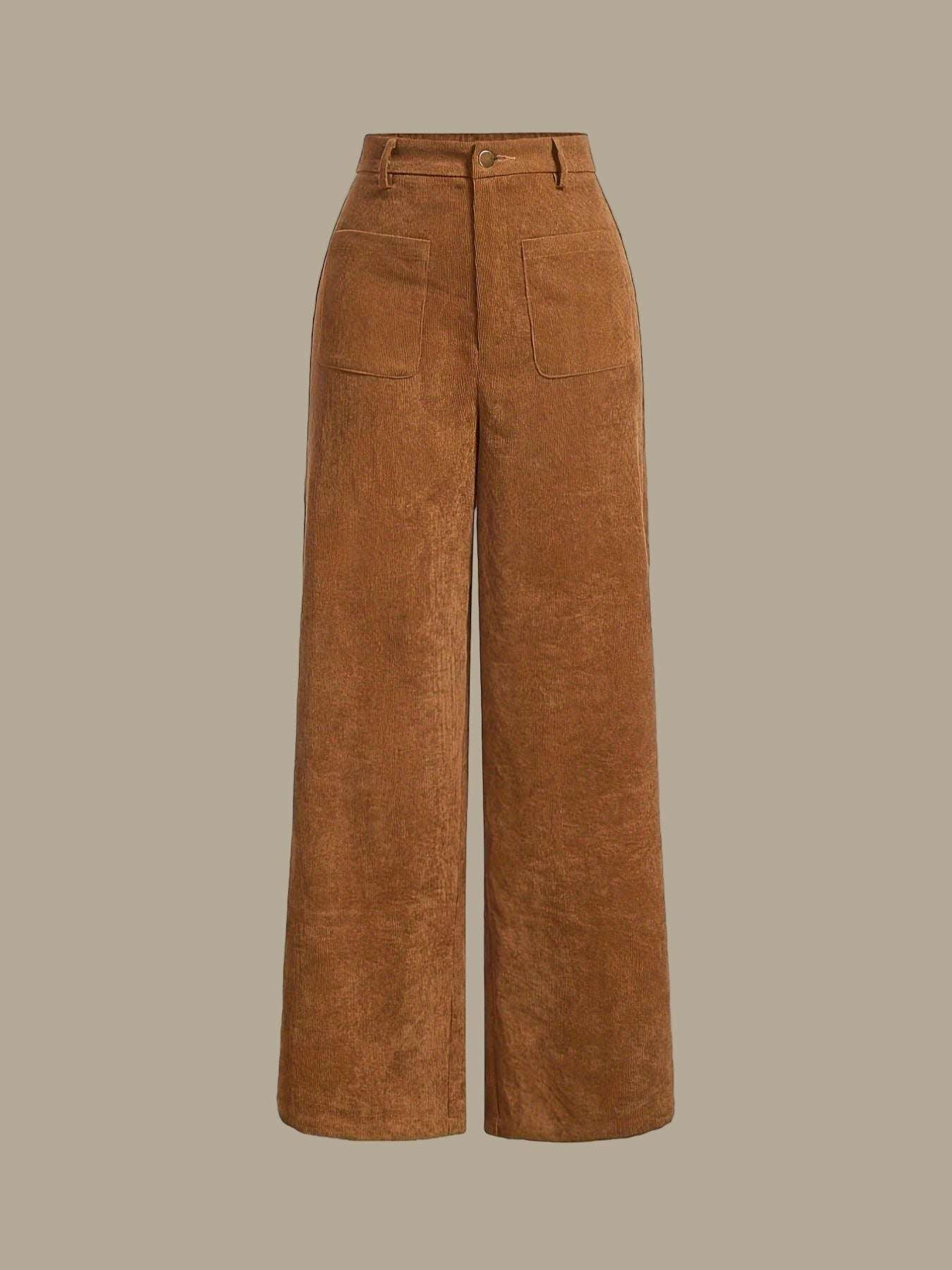 Brown corduroy pants on a light beige background