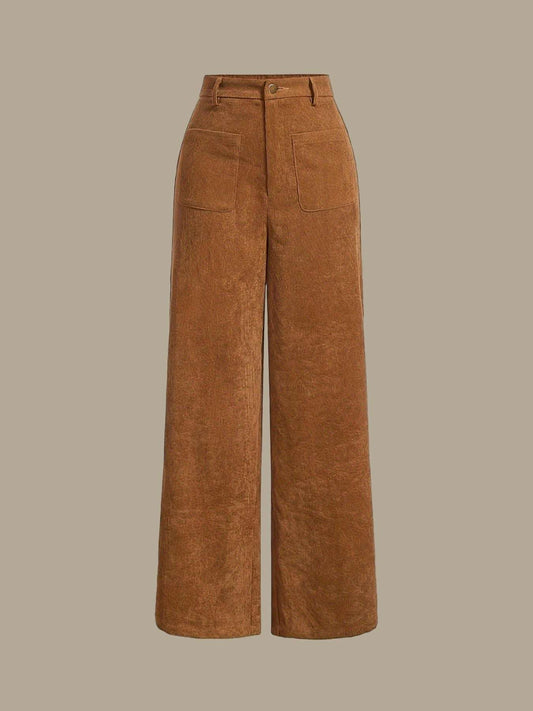 Brown corduroy pants on a light beige background