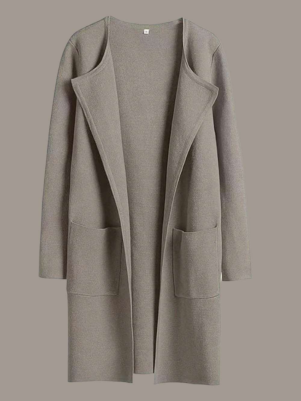 Taupe coat with a plain background