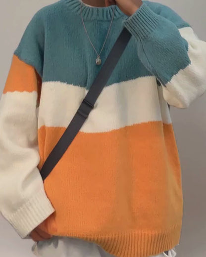 Unisex color block sweater in teal green cream and orange